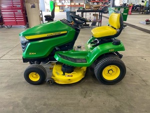 รถตัดหญ้าแบบนั่งขับ Johhn Deere X304 สีเขียวเหลือง ขับเคลื่อน 4 ล้อ เครื่องยนต์เบนซิน ใช้งานง่าย - Product Image 1