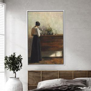 Toile imprimée style réalisme vintage : Femme sereine devant la commode, encadrée en blanc - Product Image 1
