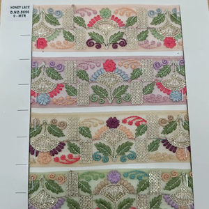 Tela de encaje bordado floral colorido vibrante y detallado con patrones intrincados perfectos para la moda de gama alta - Product Image 1