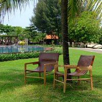 Fauteuil de relaxation minimaliste en teck massif et cuir, style Bali Mid-Century, idéal pour hôtels et resorts (intérieur/extérieur) - Meilleures ventes