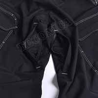 Pantalon de neige cargo unisexe imperméable noir avec surpiqûres contrastées, style ample et pantalon de ski isolé