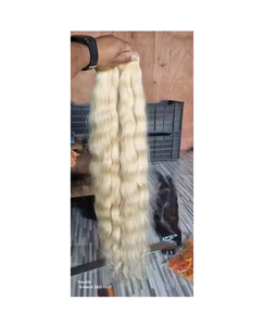 Extensiones de cabello indio Rubio sedoso en forma de trama hechas de cabello humano de buena calidad para un acabado natural - Product Image 1