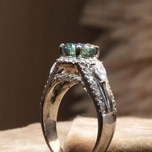 แหวนหมั้นผู้หญิงทรงกลมสีฟ้าและลูกแพร์สไตล์ไม่ซ้ำใคร - Product Image 2