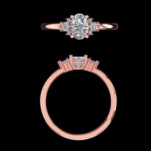 Élégante bague de fiançailles en or rose 14k 18k avec diamant ovale de 1,14 carat et trois pierres, ornée de grappes, bijoux de mariage - Product Image 1