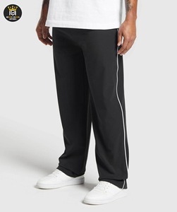 กางเกงวอร์มขายาวผ้าคอตตอนขาบานแบบเรียงซ้อน - Product Image 1