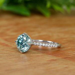 Bague de fiançailles pour femme en argent sterling 925 et moissanite ronde taille brillant couleur blanc et bleu Vvs Clarity Diamond - Product Image 3