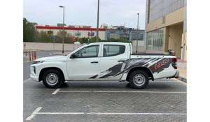 Camioneta L200 2023-2024 Usada, Cuero, Tracción en las Cuatro Ruedas, Control de Crucero Adaptativo, 6 Cilindros, Automática, Techo Panorámico, Cámara Trasera 360, 4 Plazas - Product Image 2