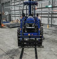 Tracteur à roues Mini Lovol TE404ROPS d'occasion avec chargeur frontal 4x4 et accessoires de chariot élévateur