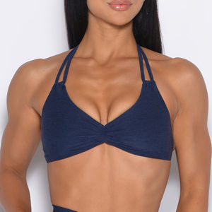 เสื้อชั้นในกีฬาผู้หญิงคุณภาพดี ดีไซน์ไขว้หลัง ระบายอากาศได้ดี ยืดหยุ่นสูง โลโก้ด้านหน้า เป็นมิตรกับสิ่งแวดล้อม มีไซส์พลัส สำหรับออกกำลังกาย โยคะ - Product Image 1