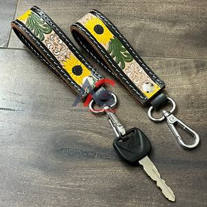 พวงกุญแจแฟชั่นลายดอกไม้หนังวัวแท้พวงกุญแจเครื่องประดับสำหรับทุกเพศ - Product Image 1