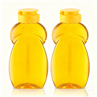 Bouteilles vides recyclables en plastique PET 360ml 500g pour le miel et le champagne avec bouchons jaunes à rabat
