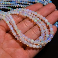 Perles d'opale naturelle éthiopienne bonne qualité boules de feu multiples blanches forme gemmes boules unies prix de gros Mehrajudin gemmes troisième