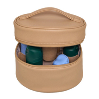 Nouveau design de sac de maquillage rond en cuir PU végétalien recyclé personnalisé sac de courtoisie de voyage essentiel avec poches élastiques