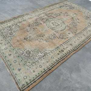 Vintage Turkish Rug 5.4x9.1 ft, <b>Brown</b> Large Animal Print <b>Wool</b> Rug - Product Image 4