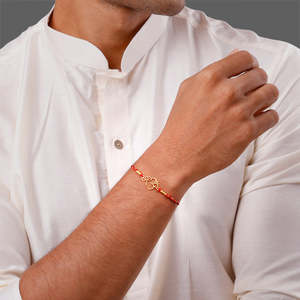 Combo de Rakhi Golden Sacred Bloom con Pulseras y Brazaletes Elegantes para un Hermoso Look Raksha Bandhan - Product Image 1