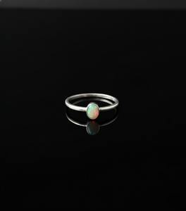 Bague de fiançailles vintage de style chrétien en argent 925, opale naturelle d'Éthiopie Welo, taille ovale, sertie en bélière, pour enfants - Product Image 1