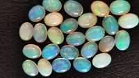 Opales éthiopiennes blanches naturelles 6x4mm de forme ovale Welo Opal Cabochon Cut Pierres pour bijoux Loose Multi Fire White Opal Cabs