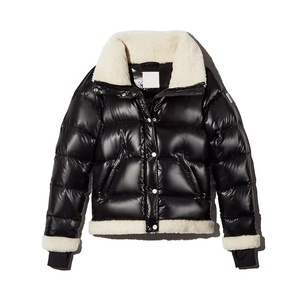 Veste matelassée noire pour femme AMS SPORTS INTL, col rembourré, manches longues, vêtement d'hiver, couleur unie, matière polyester, écologique - Product Image 1