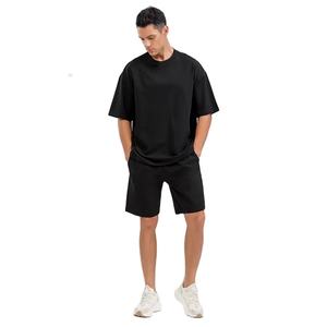 Ensembles de t-shirts et shorts en coton 100% avec logo personnalisé pour hommes, survêtement uni surdimensionné de coupe large, streetwear d'été respirant à la mode - Product Image 4