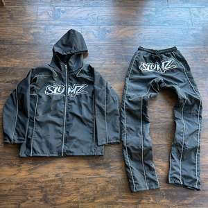 Ensemble coupe-vent OEM, fabrication sur mesure, logo brodé réfléchissant, veste légère en nylon zippée, survêtement 100% nylon pour hommes - Product Image 4