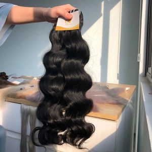 Cabello crudo vietnamita Precio al por mayor Paquetes de ondas naturales Proveedor de cabello crudo 100% Cabello vietnamita Grado superior - Product Image 1