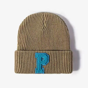 Venta caliente gorros cálidos de invierno unisex bordado 3D personalizado gorra de calavera sólida con estilo a cuadros en colores especiales - Product Image 1