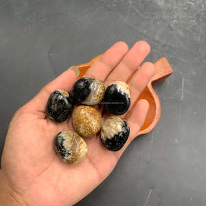 Piedra natural premium de raíz de palma con ojos – Cristal de madera fósil exótica de Indonesia con patrones oculares únicos (2–3 cm) - Product Image 4