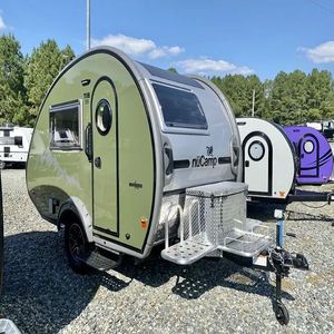 Petite caravane de camping tout-terrain en forme de larme avec tente à vendre et maisons mobiles sur roues. - Product Image 5