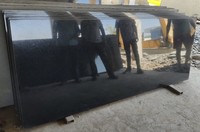 Dalles et blocs de granit brun clair au design traditionnel, surface polie, application extérieure, finition flammée, grandes dalles durables, garantie à vie