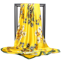 Elégant foulard carré en soie à imprimé floral et feuilles en bleu, sarcelle, orange et crème pour femme