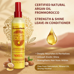 Après-shampoing sans rinçage à l'huile d'argan du Maroc Creme of Nature pour cheveux abîmés, secs, crépus et bouclés - Product Image 1
