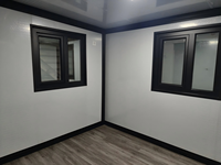 Fabriqué en Chine, maison conteneur pliable à double aile de 20 pieds, extensible, détachable et mobile, pour salle de conférence ou logement extérieur