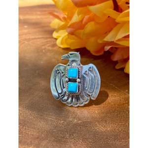 Navajo-Crafted Pear Shaped Sleeping Beauty Turquoise Sterling <b>Silver</b> Thunderbird <b>Ring</b> Bezel Set <b>Opal</b> Size 7.25 for Everyday Wear - Product Image 1