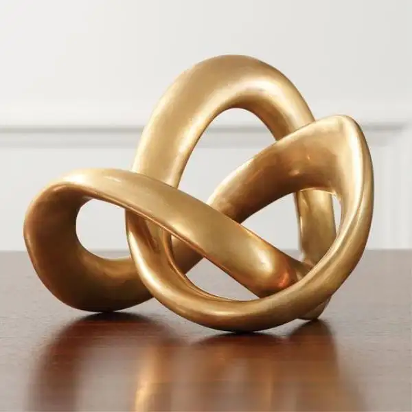 Sculpture décorative de noeud d'or en métal d'or classique moderne d'accent pour le salon produit de haute qualité