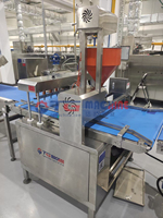 Machine automatique de production de gâteaux avec découpe de précision