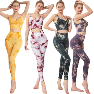 Venta al por mayor nuevos conjuntos de yoga para mujer de 2 piezas de cintura alta logotipo frontal sólido sin costuras mallas transpirables y sujetadores de fitness - Product Image 1