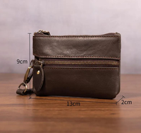 Porte-clés élégant et compact en cuir véritable de haute qualité avec fermeture à bouton-poussoir, doublure lisse et blocage RFID