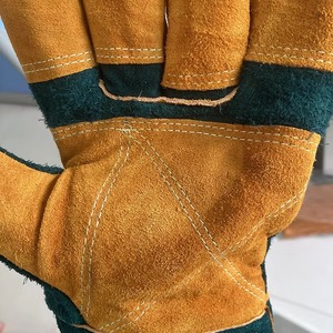 Venta al por mayor Guantes de soldador alargados de piel de vaca Guantes de trabajo de cuero de doble capa gruesa anti-caliente - Product Image 5