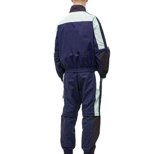 Venta al por mayor de chándales deportivos ligeros de nailon bloque de color chaqueta cortavientos y conjunto de Jogger de poliéster sólido chándal para correr - Product Image 5