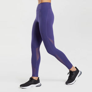 Leggings de sport pour femmes à taille mi-haute, couleur unie, impression de logo personnalisée, tissu respirant à séchage rapide, vente directe d'usine pour la salle de sport - Product Image 2