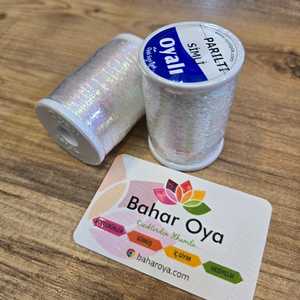 Hilo artificial de seda bordado con efecto de purpurina - Product Image 1