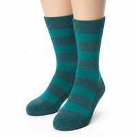 Chaussettes d'hiver chaudes en laine mérinos/nylon, épaisses, à motif, antidérapantes, respirantes, avec logo personnalisé sur le bord, pour femmes, OEM, usage quotidien