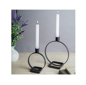 Elegant <b>black</b> iron candle holder with sophisticated Baroque detailing and premium artistic craftsmanship - Product Image 1