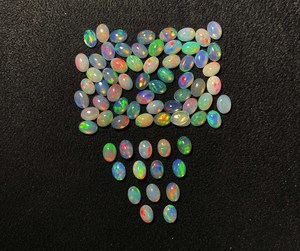 Pierres en vrac ovales rouges de 3 à 8 mm à facettes multiples en opale éthiopienne de qualité AAA pour la fabrication de bijoux certifiées par IGI - Product Image 5