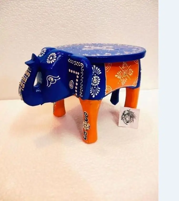 Rajasthani Stool Wooden Elephant Design The stool has an attractive embossed design running It can be used in home Office