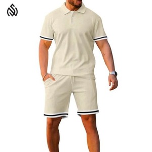 ชุดกีฬาวิ่งจ๊อกกิ้งชุดกางเกงขาสั้นทรงปกติคุณภาพระดับพรีเมียมชุดออกกำลังกายชุดเสื้อโปโลผู้ชายใส่สบายชุดแฝด - Product Image 1