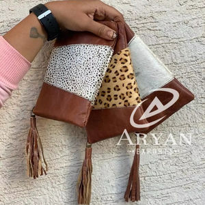 Bolso con cremallera y borlas de cuero de vaca genuino con estampado de animales de alta calidad para mujer, bolso de mano de diseñador de lujo personalizado - Product Image 1