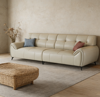 Canapé modulable en cuir contemporain haute résilience avec coussins moelleux, idéal pour salon ouvert
