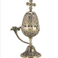 Brûleur d'encens moderne en aluminium moulé finition or, design tibétain, pour parfum bois de santal et coriandre, type à ressort