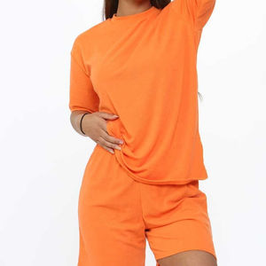 Nouveau conçu dames été ensembles extérieur arrivée solide motif T-Shirts avec au-dessus du genou Shorts grande taille prix de gros 2026 - Product Image 5